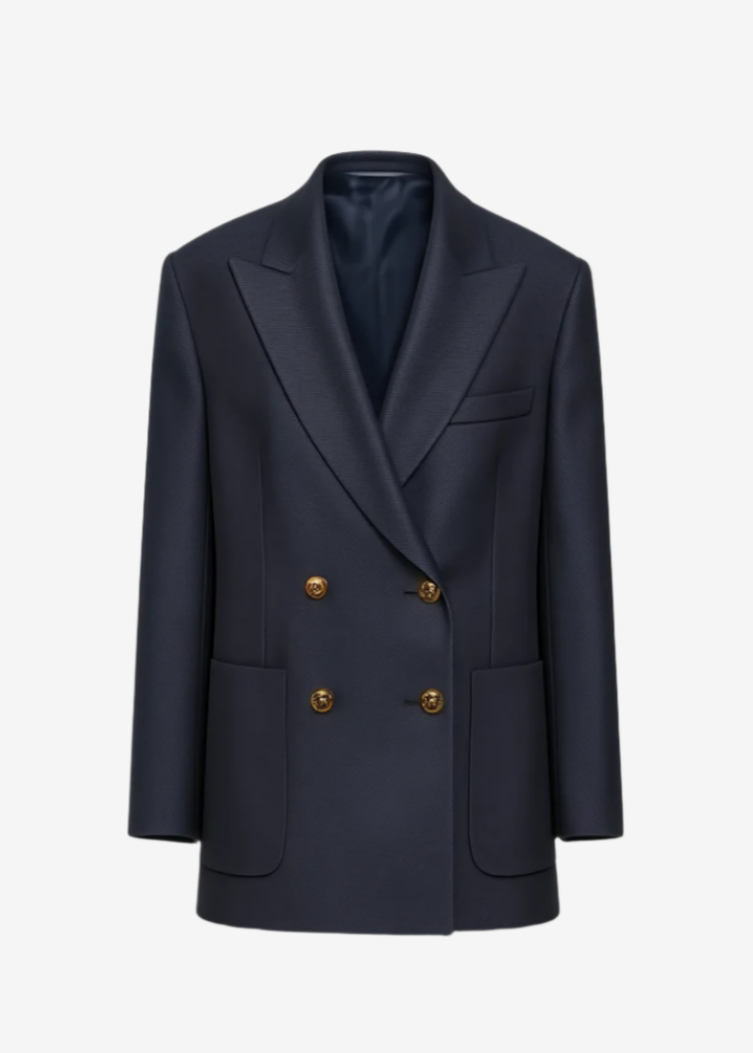 navy double-breasted blazer with gold buttons and two front pockets. 
